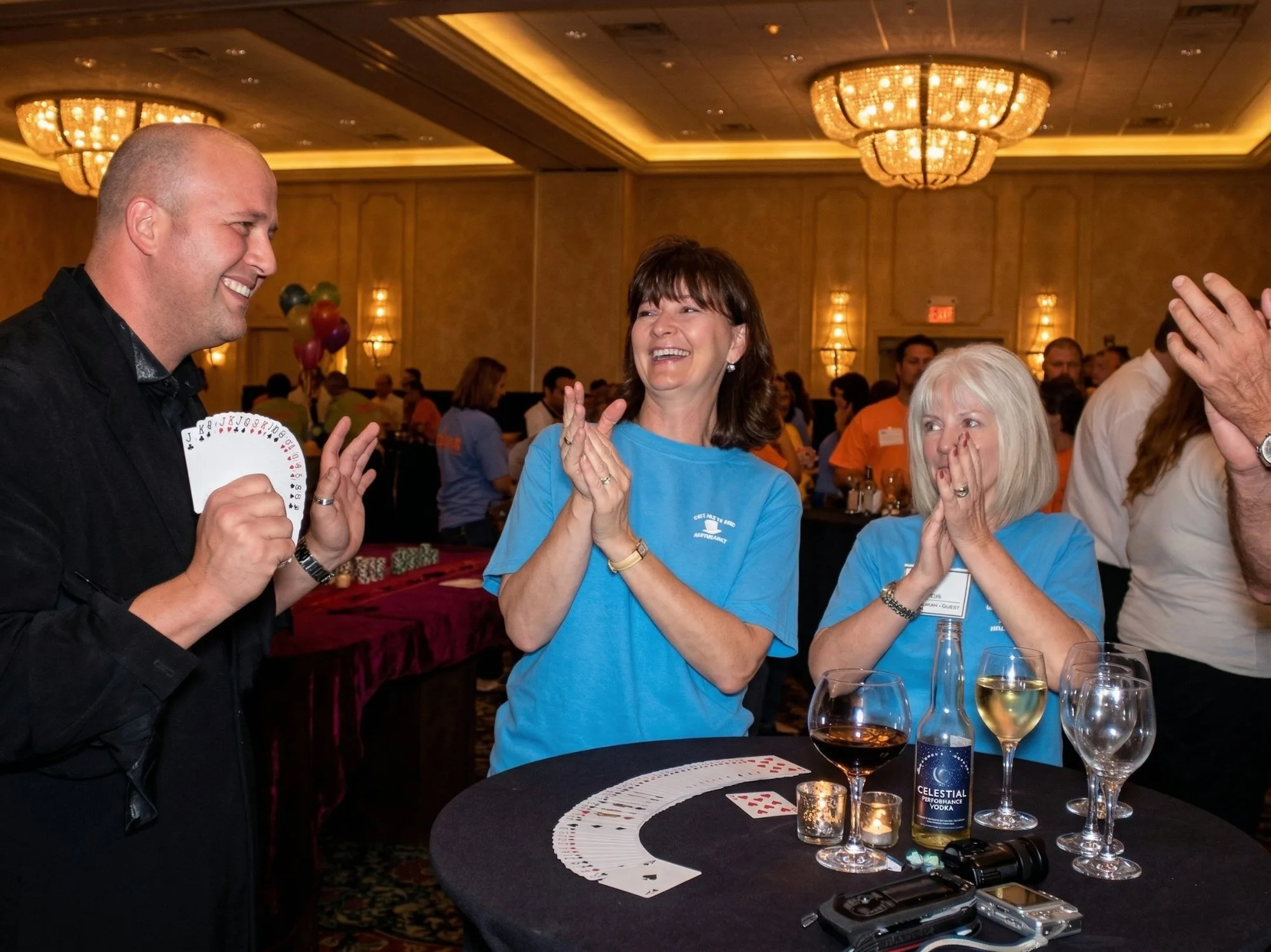 Women amazed during Mike DiDomenico corporate event performance